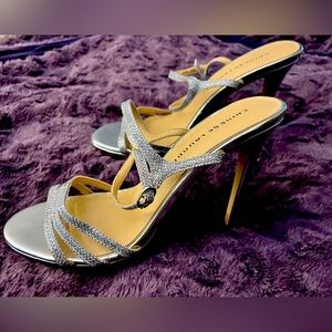 Women’s silver heels, size 10.gorgeous accent to any color dress!